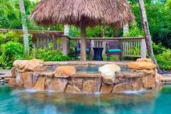 Pastel Boulder spa waterfall with Crazy Horse Flagstone
